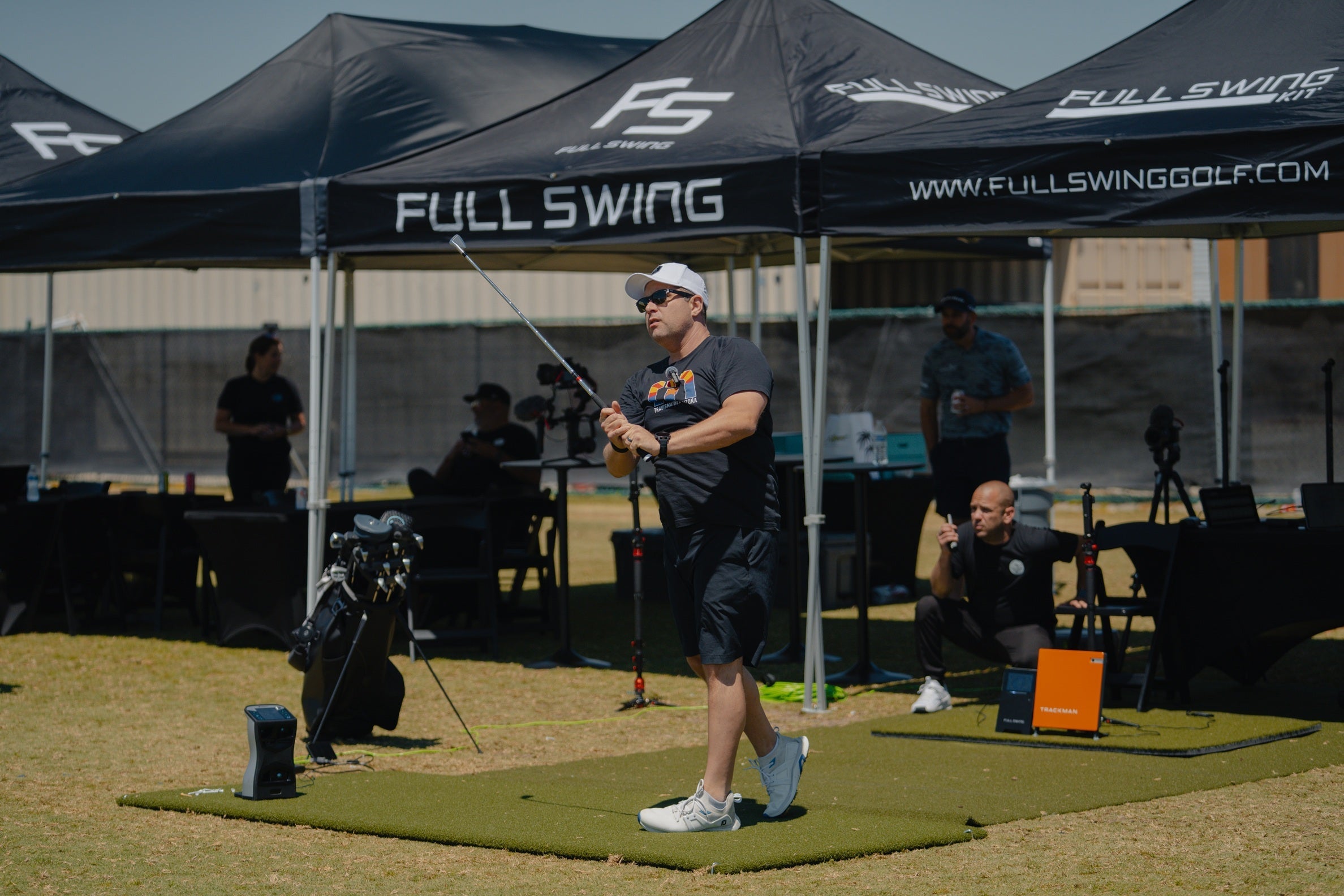 iOS & Android App Integration: Connects seamlessly with the Full Swing app for smart devices, allowing users to view, analyze, and export data, share video, and customize display preferences, with additional support for E6 Connect simulation software for